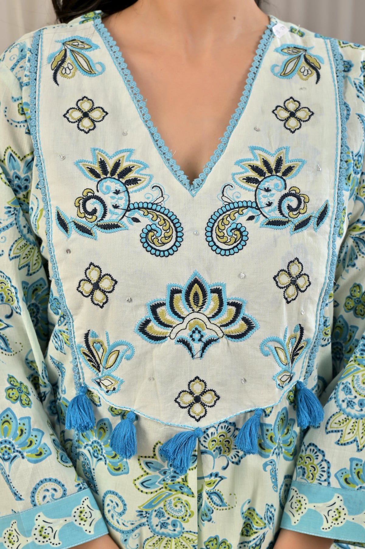 Printed A-Line Kurta Set with Embroidered Yoke & Tassel Detail
