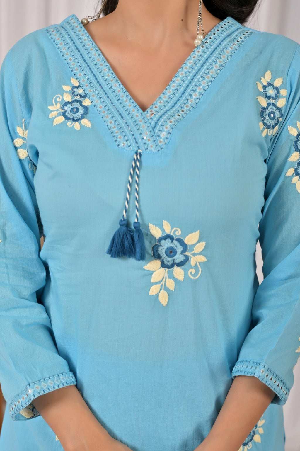 Women’s Embroidered Kurta Set with V-Neckline & Tassel Detailing