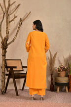 Women’s Embroidered Kurta Set with V-Neckline & Tassel Detailing
