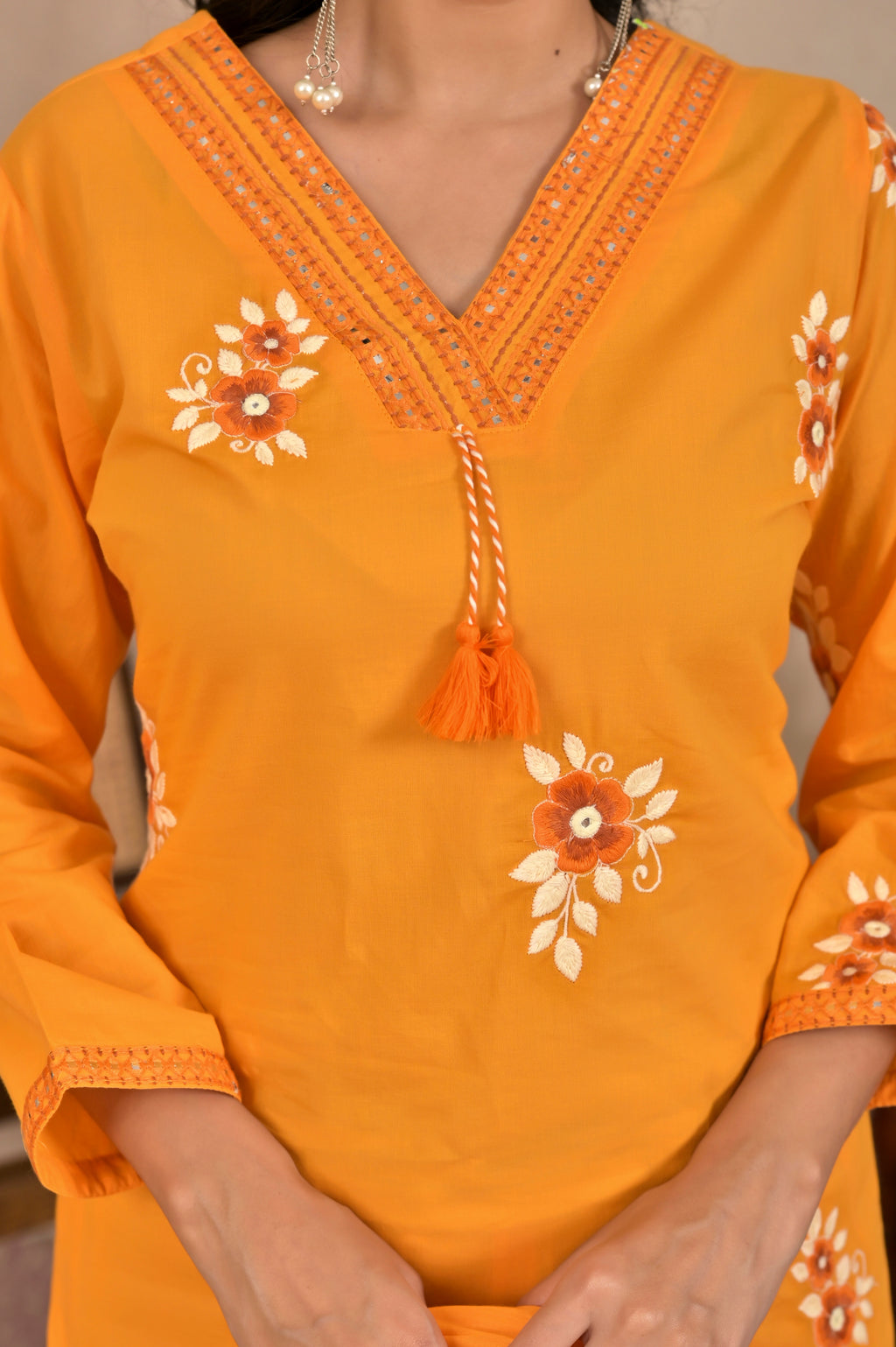 Women’s Embroidered Kurta Set with V-Neckline & Tassel Detailing